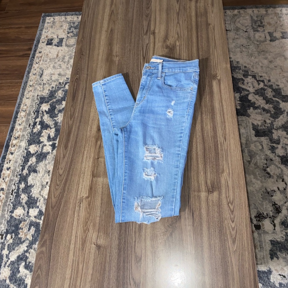 High rise super skinny light blue levi jeans